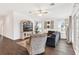 Spacious living room with hardwood floors and comfy furniture at 11272 Stewart Loop, Oxford, FL 34484