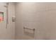 Clean shower with grab bar and tiled walls at 11272 Stewart Loop, Oxford, FL 34484