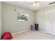 Bedroom with a window, a ceiling fan, neutral walls, carpeting and a closet at 118 Shomate Dr, Longwood, FL 32750