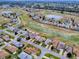 Aerial view showing a house's location in a golf course community at 12060 Se 176Th Loop, Summerfield, FL 34491