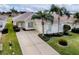 Aerial view of a single-story home and driveway at 12060 Se 176Th Loop, Summerfield, FL 34491