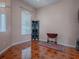 Small dining area with hardwood-style floor and a room divider at 12060 Se 176Th Loop, Summerfield, FL 34491