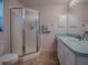 Updated bathroom with a corner shower at 1218 Augustine Dr, Lady Lake, FL 32159