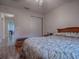 Bedroom with a double bed and access to another room at 1218 Augustine Dr, The Villages, FL 32159