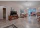 Casual dining area with wood table and chairs, near kitchen at 1218 Augustine Dr, Lady Lake, FL 32159