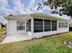 Well-maintained home with a screened lanai at 1218 Augustine Dr, Lady Lake, FL 32159