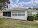 Exterior view of the house with landscaping at 1218 Augustine Dr, The Villages, FL 32159