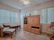 Relaxing sunroom with wicker furniture and ample natural light at 1218 Augustine Dr, The Villages, FL 32159