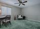 Bedroom with wicker chair and window seat at 1235 Avenida De Las Casas, The Villages, FL 32159