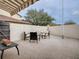 Outdoor patio with seating area and awning at 1235 Avenida De Las Casas, The Villages, FL 32159