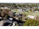 Aerial view showcasing the home's location in a quiet neighborhood at 12430 Blue Heron Way, Leesburg, FL 34788