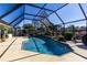 Relaxing screened-in pool with plenty of surrounding space at 12430 Blue Heron Way, Leesburg, FL 34788