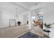 Elegant dining room with chandelier and mirror at 12592 Se 97Th Terrace Rd, Summerfield, FL 34491