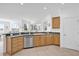 Kitchen with ample counter space and wood cabinets at 12592 Se 97Th Terrace Rd, Summerfield, FL 34491