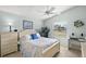 Bright bedroom with a queen-size bed and ample closet space at 1280 Mount Vernon Way, The Villages, FL 32162