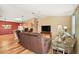 Living room with hardwood floors and comfortable seating at 1280 Mount Vernon Way, The Villages, FL 32162