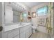 Bathroom with vanity, toilet, and shower/tub combo at 13588 Sw 105Th Pl, Dunnellon, FL 34432