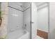 Simple bathroom with a shower/tub and tiled walls at 13588 Sw 105Th Pl, Dunnellon, FL 34432