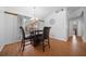 Dining area with wood table and chairs, hardwood floor at 13588 Sw 105Th Pl, Dunnellon, FL 34432