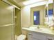 Bathroom with shower and vanity at 13635 Berkshire Ct, Grand Island, FL 32735