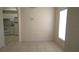 Bright dining room featuring tiled floors and natural light, adjoining the kitchen area at 137 Country Lakes Cir, Groveland, FL 34736