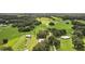 Aerial view of a large property with multiple buildings and lush green pastures at 1392 Sw 103Rd Ave, Webster, FL 33597