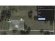 Aerial view of a home and its surrounding land at 1392 Sw 103Rd Ave, Webster, FL 33597