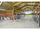 Spacious barn with multiple stalls, perfect for horses at 1392 Sw 103Rd Ave, Webster, FL 33597