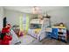 Fun ' bedroom with a bunk bed and colorful decor at 1392 Sw 103Rd Ave, Webster, FL 33597