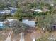 Aerial view of a single-Gathering home with a large backyard and surrounding trees at 1395 Morningside St, Mount Dora, FL 32757