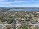 Aerial view of a home near a lake and residential neighborhood at 1395 Morningside St, Mount Dora, FL 32757