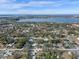 Wide aerial view of a neighborhood near a lake at 1395 Morningside St, Mount Dora, FL 32757