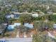 Aerial view showing a single-Gathering home's location within a residential neighborhood at 1395 Morningside St, Mount Dora, FL 32757