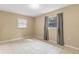 Bedroom with tile floors, neutral walls and grey curtains at 1395 Morningside St, Mount Dora, FL 32757