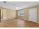 Bright bedroom with laminate floors and ceiling fan at 1395 Morningside St, Mount Dora, FL 32757