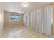 Simple dining room with tile floors and neutral walls at 1395 Morningside St, Mount Dora, FL 32757