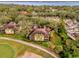 Aerial view of community near the lake at 14 Camino Real Blvd # 14, Howey In The Hills, FL 34737