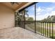 Spacious screened porch overlooking a golf course at 14 Camino Real Blvd # 14, Howey In The Hills, FL 34737