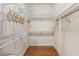 Large walk-in closet with ample shelving and hanging space at 14 Camino Real Blvd # 14, Howey In The Hills, FL 34737