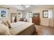 Main bedroom with mid-century modern furniture and wood floors at 1401 Lake Shore Blvd, Tavares, FL 32778