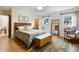 Main bedroom with mid-century modern furniture and wood floors at 1401 Lake Shore Blvd, Tavares, FL 32778