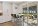 Kitchen breakfast nook with view of the backyard pool and lake at 1401 Lake Shore Blvd, Tavares, FL 32778