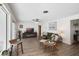 Bright living room with fireplace and wood floors at 1401 Lake Shore Blvd, Tavares, FL 32778