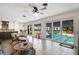 Living area with kitchen and pool view at 1401 Lake Shore Blvd, Tavares, FL 32778