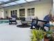 Relaxing patio with seating area and pool view at 1401 Lake Shore Blvd, Tavares, FL 32778