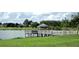 Scenic lakefront property with gazebo and a peaceful view at 14267 Se 85Th Ter, Summerfield, FL 34491