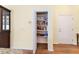 Well-organized pantry with ample shelving for storage at 1521 Trenton Ln, The Villages, FL 32162