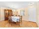 Elegant dining room with hardwood floors and chandelier at 1526 Lozano Ave, Lady Lake, FL 32159