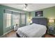 Guest bedroom with bay window and neutral decor at 1712 Palo Alto Ave, Lady Lake, FL 32159