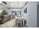 White table and chairs in a bright dining room at 1712 Palo Alto Ave, Lady Lake, FL 32159